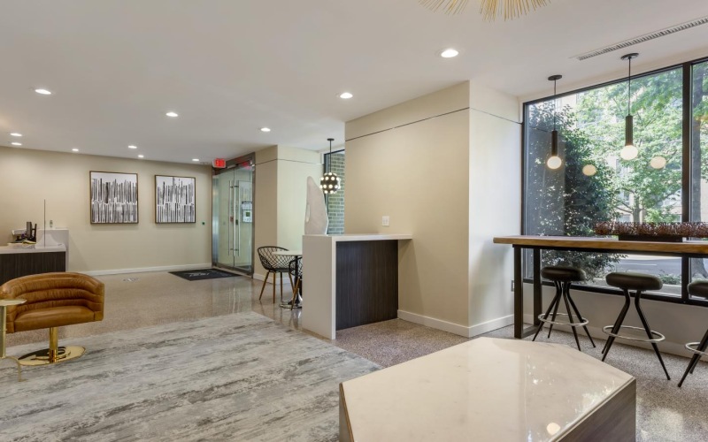 a room with a table and chairs