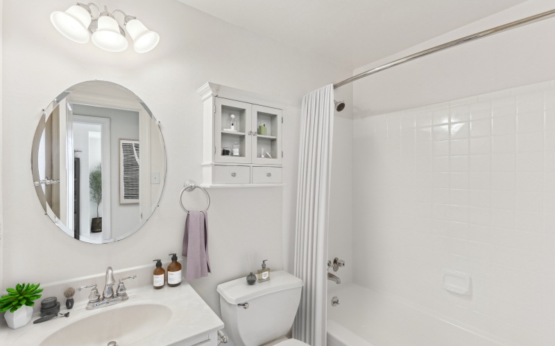bathroom with tile shower tub combo 